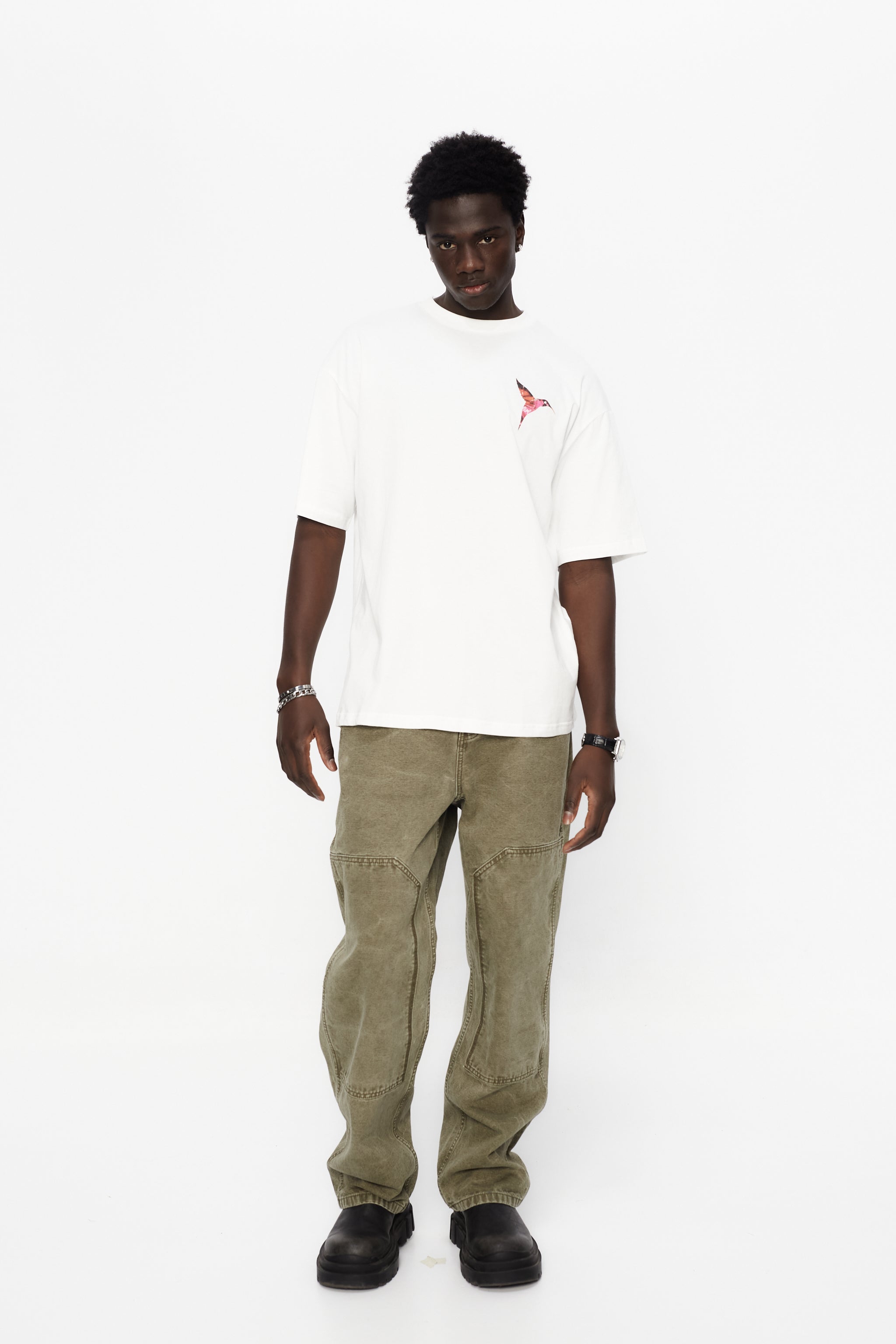 Oversized t-shirt with round neck and short sleeves. Contrast combined print detail on front and back