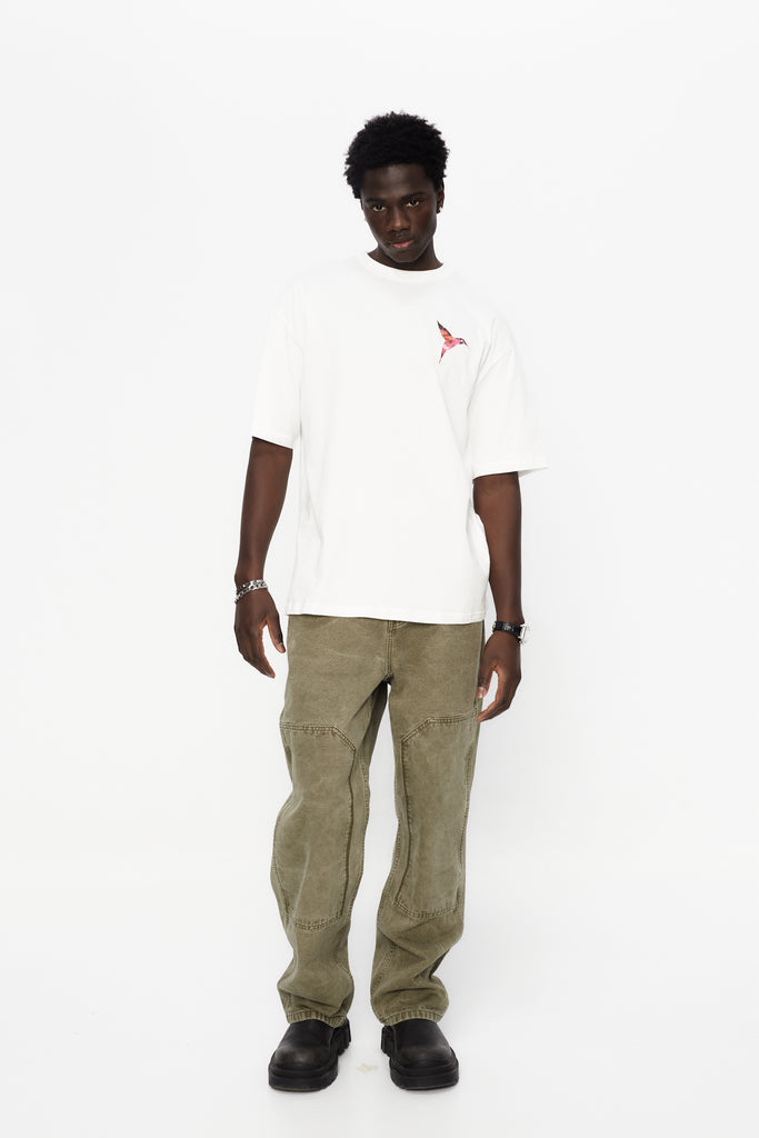 Oversized t-shirt with round neck and short sleeves. Contrast combined print detail on front and back