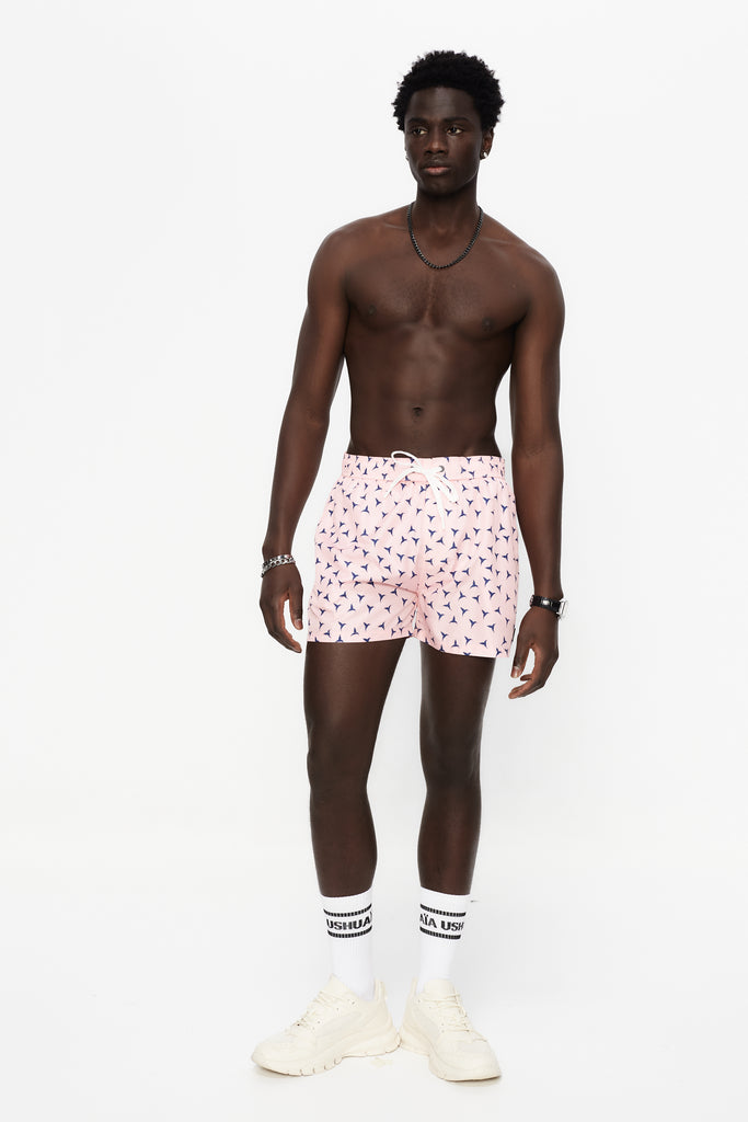 Swimsuit made of technical fabric. Adjustable elastic waistband with drawstring. Side pockets, rubberized application detail on the front and patch pocket on the back. Inner lining.