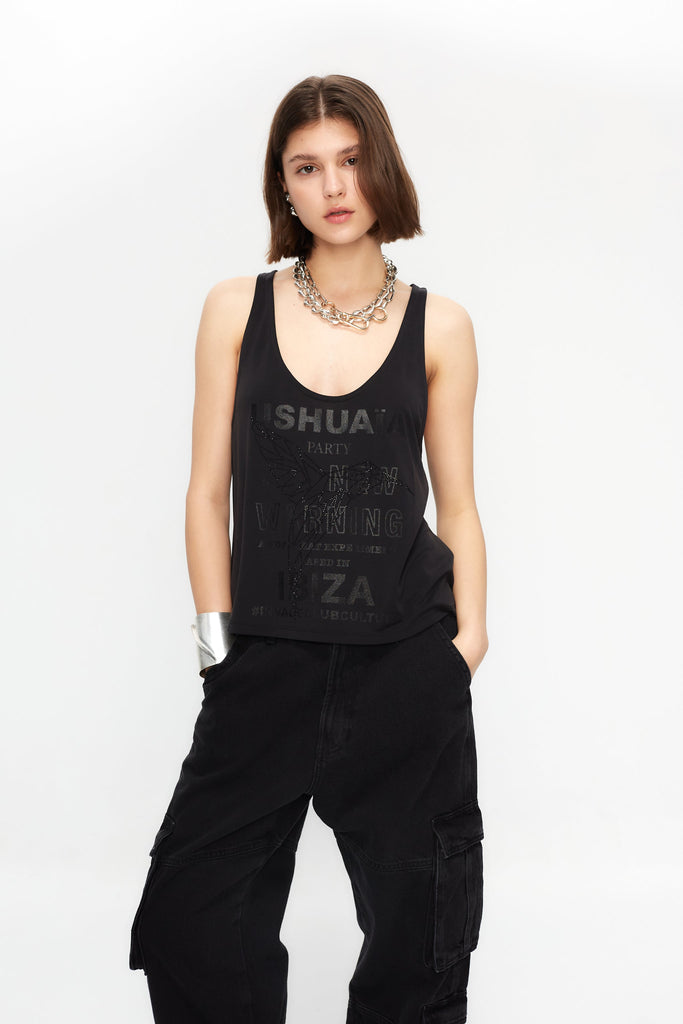 Black loose-fit tank with glitter effect & rhinestone details. Perfect for bold Ibiza looks. Shop your statement vibe now!