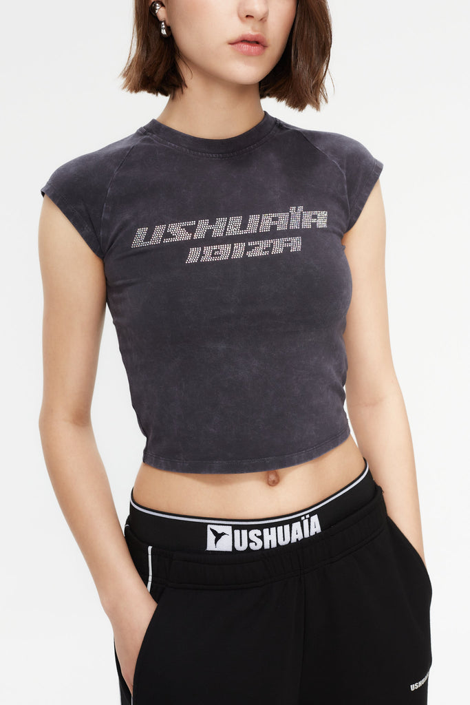 Wide-leg trousers with elastic waistband. Features side print detail and reflective piping.