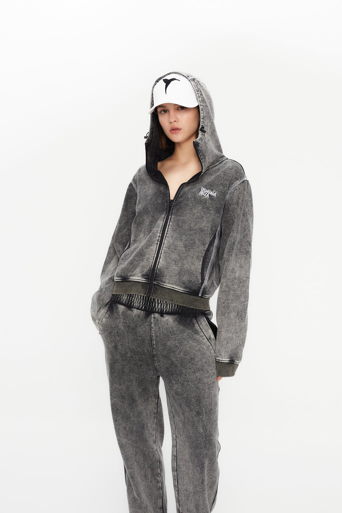 Wide-leg trousers with elastic waistband. Acid wash finish, contrast side print and reflective piping. Full-length design.
 