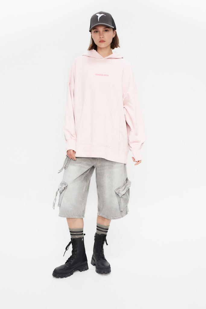 Oversized sweatshirt with hood and long sleeves, washed with a peach-effect finish. Features contrasting combined print on the front and back, and front welt pockets. 
 