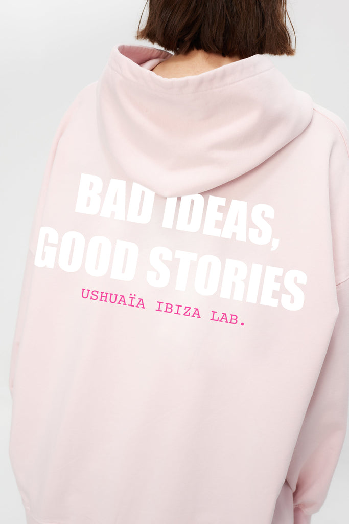 Oversized sweatshirt with hood and long sleeves, washed with a peach-effect finish. Features contrasting combined print on the front and back, and front welt pockets. 
 