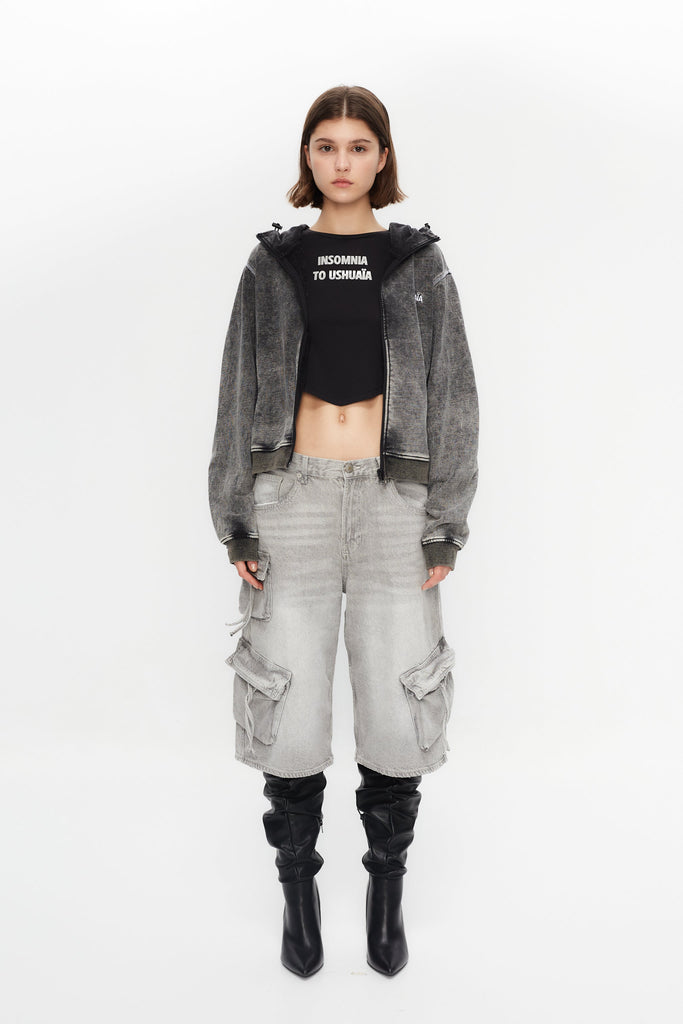 Hoodie with acid wash finish. Features a zipper running from sleeve to sleeve across the back, revealing a hidden print in white finish.