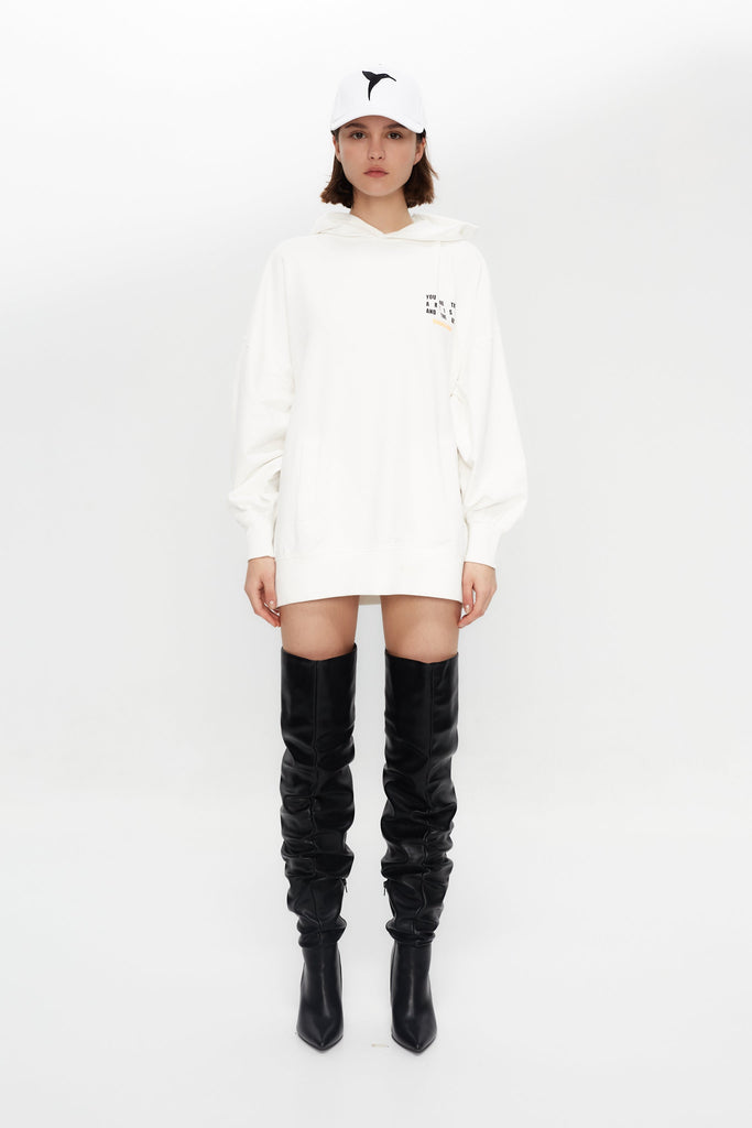 Oversized hoodie with bold graphic print for a trendy Ibiza streetwear look. Cozy & stylish for cool summer nights. Shop now!