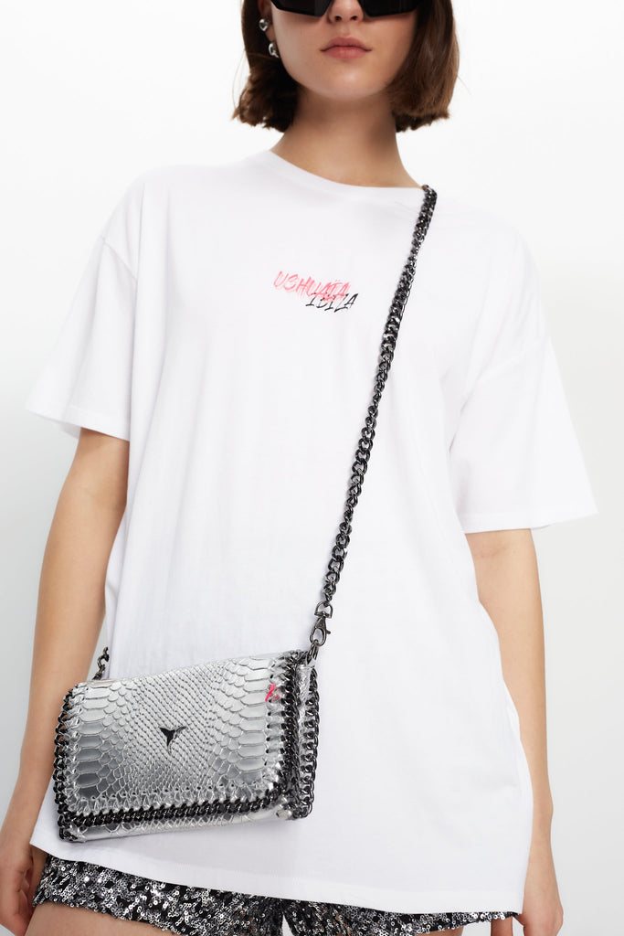 Oversized T-shirt with bold front & back print for a streetwear edge. Perfect for Ibiza summer vibes. Shop the look now!