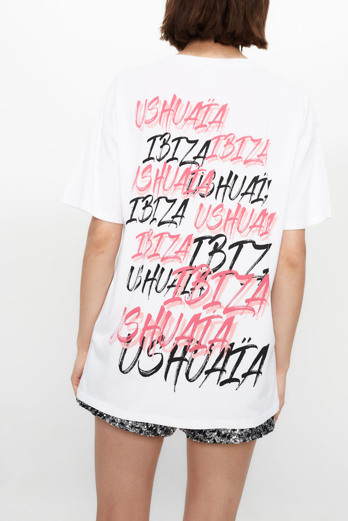 Oversized T-shirt with bold front & back print for a streetwear edge. Perfect for Ibiza summer vibes. Shop the look now!