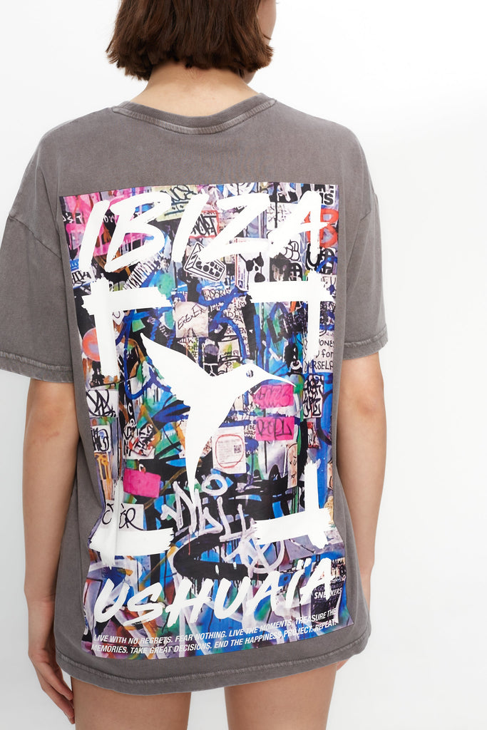 Oversized acid-wash T-shirt with bold front & back print. Perfect for streetwear lovers and Ibiza vibes. Shop the statement tee now!