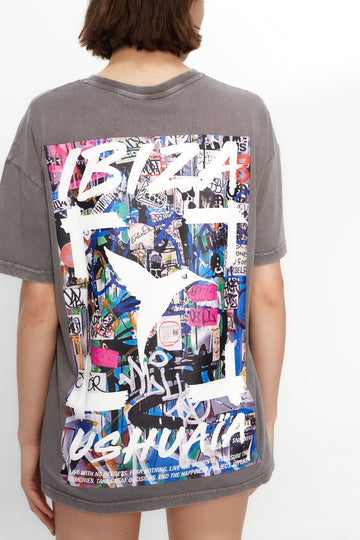 Oversized acid-wash T-shirt with bold front & back print. Perfect for streetwear lovers and Ibiza vibes. Shop the statement tee now!