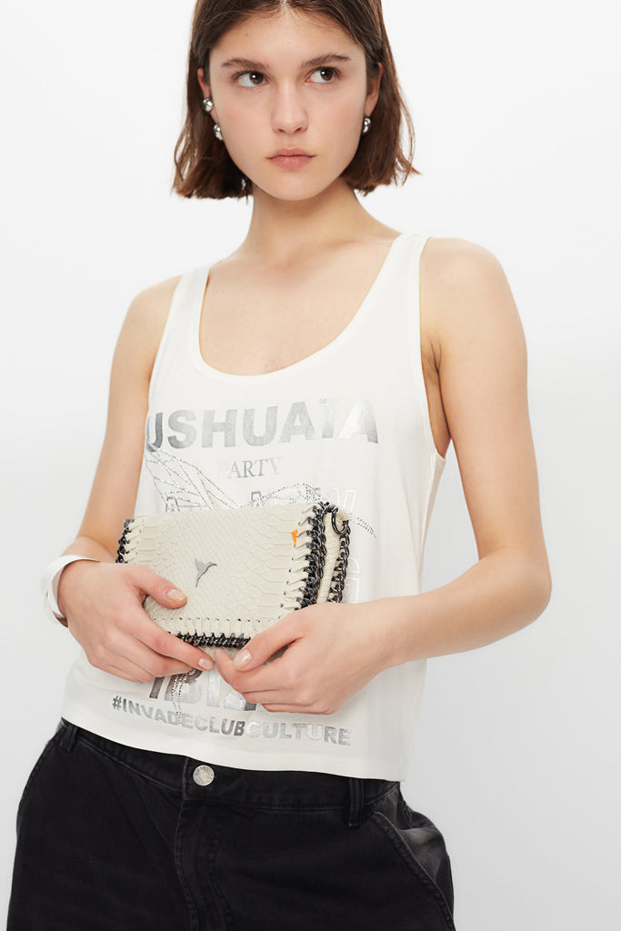 Tank top with round neck and armhole sleeves. Contrast metallic print combined with rhinestones on the front. Stitching detail on the back.
 