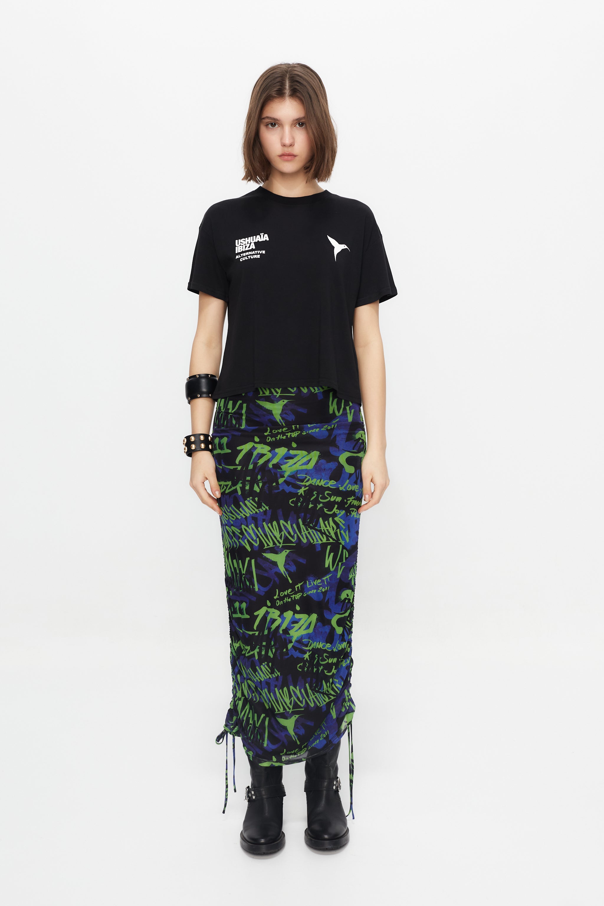 Elastic skirt with lining made of printed mesh fabric. Height adjustable with side rails with drawstring