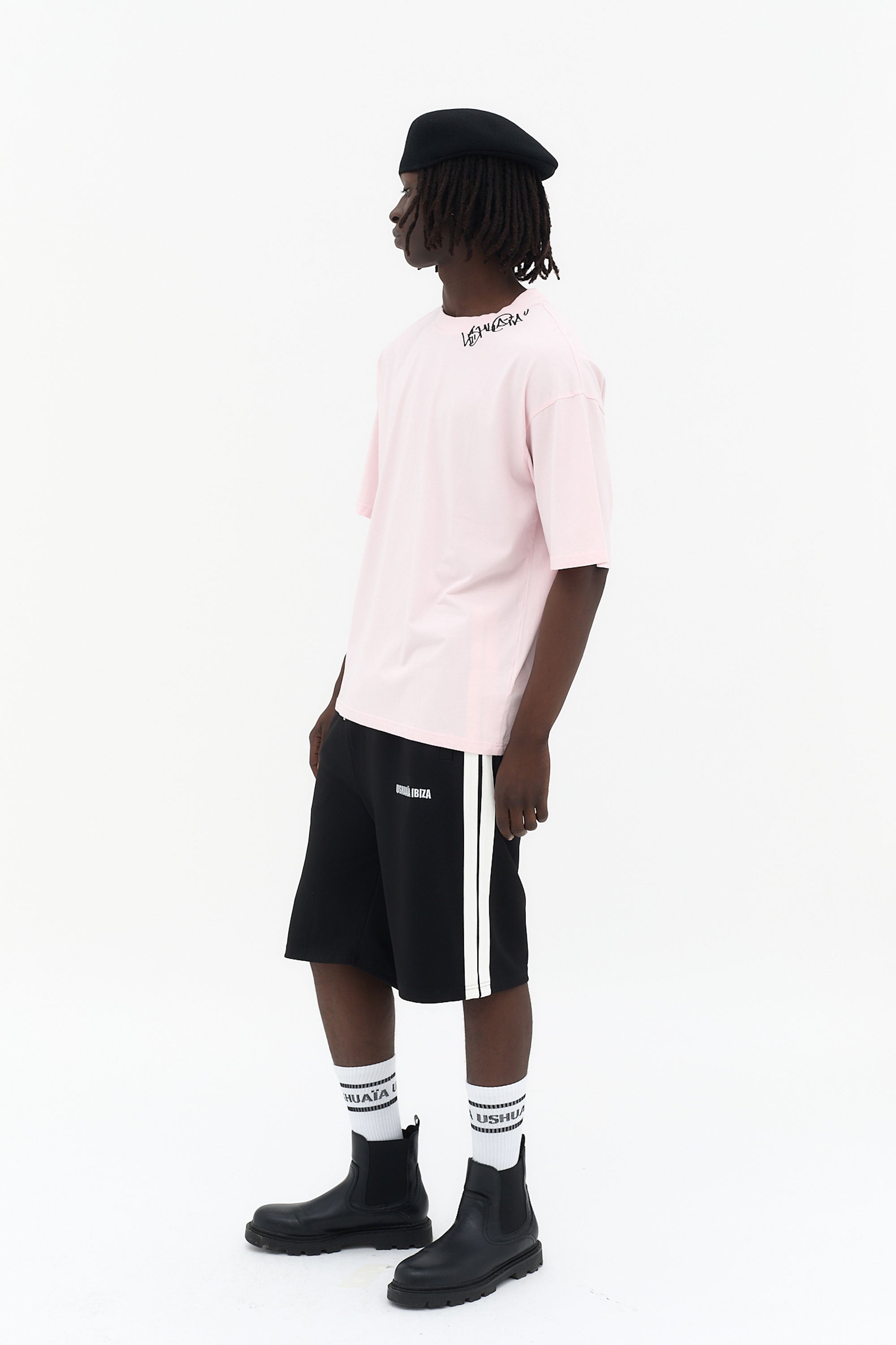 shorts hombre negros banda lateral blanca