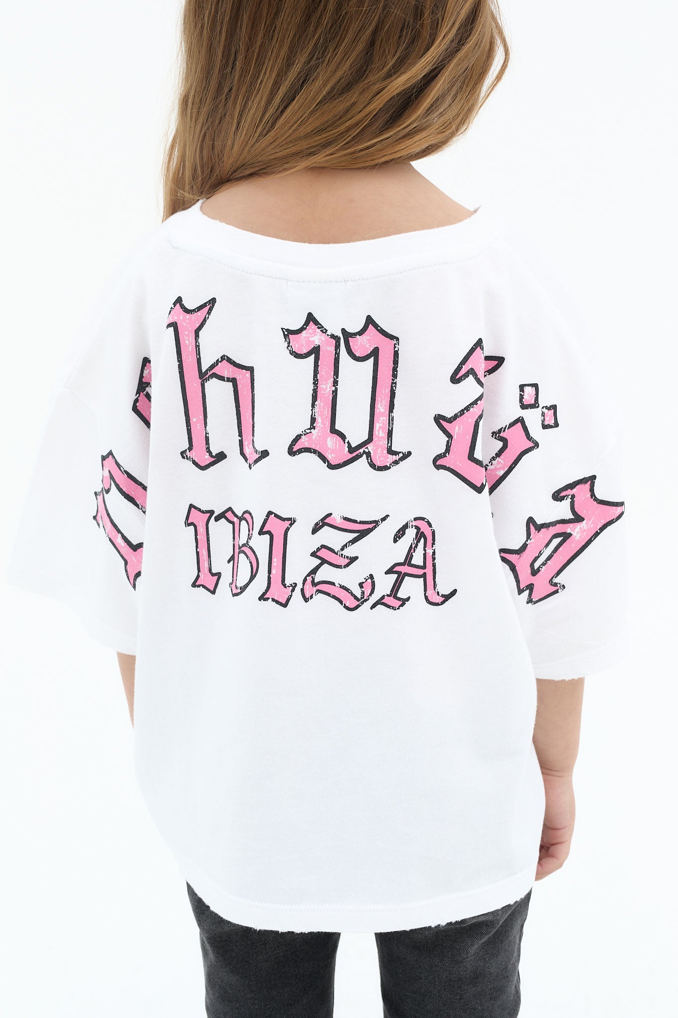 camiseta niña blanca cropped logo ushuaia