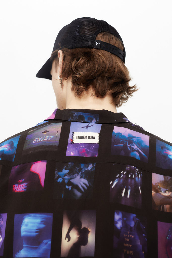 Printed shirt made of blend fabric. Lapel collar and short sleeve. Front button closure. Patch detail on the front and personalized label on the back.