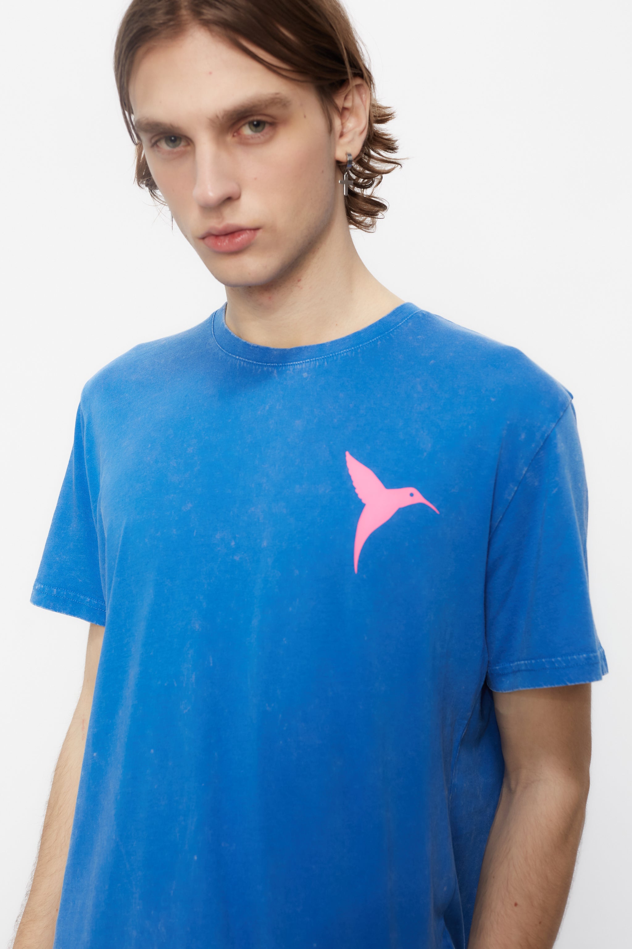 Regular fit t-shirt with round neck and washed short sleeves with fade out effect. Contrast combined print detail on front and back.