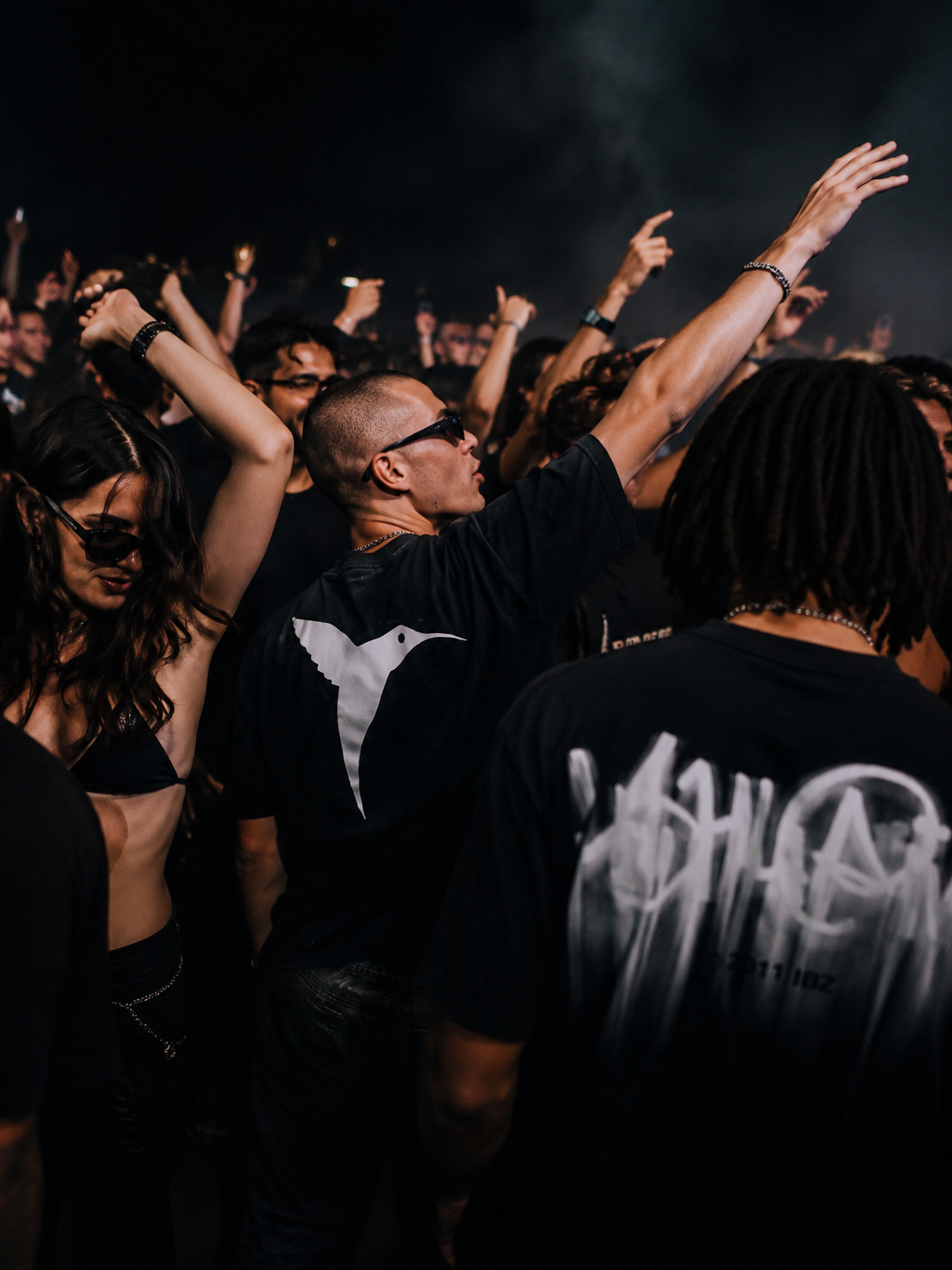 Model wearing black Ushuaïa Ibiza t-shirt at nightlife-inspired event
